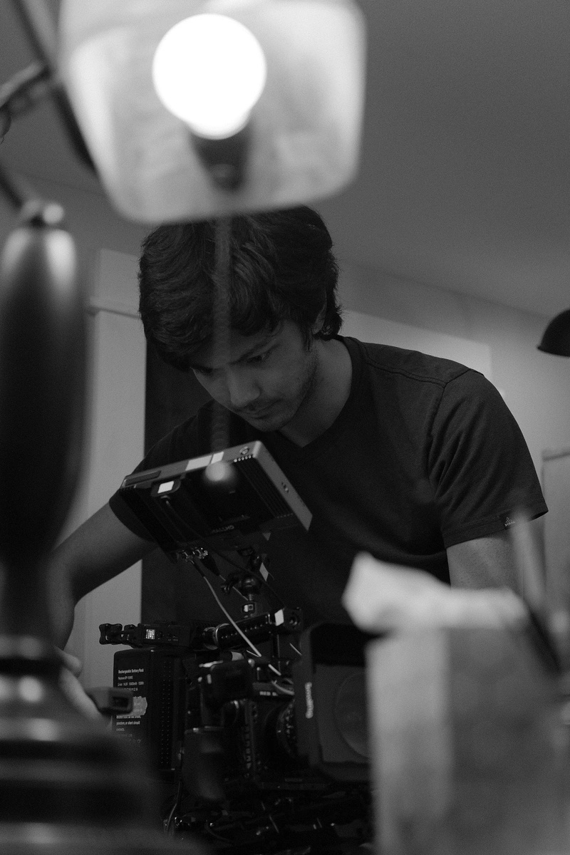 Ronan Furuta using a cinema camera on the set of Blackout